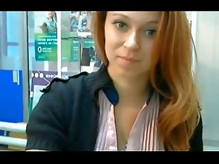 Redhead secretary plays on cam while at work
