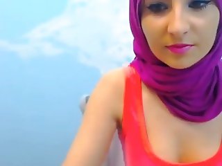 Hot Arab babe dancing with hijab on.
