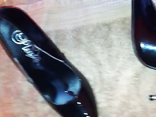 Cum into shiny black shoes on instruction from web babe