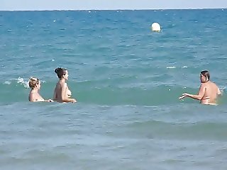 Three Spanish Women Walking into the Sea