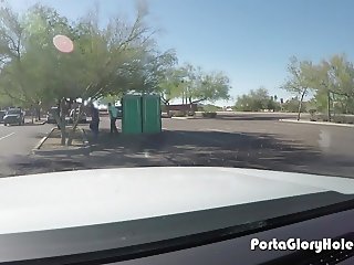 Porta Gloryhole Mature secretary sucks cock in public