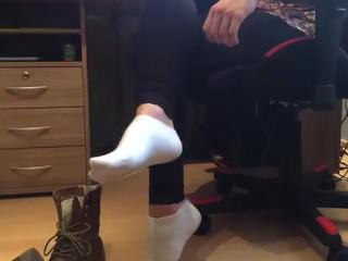 Pretty teen girl wearing boots and white socks